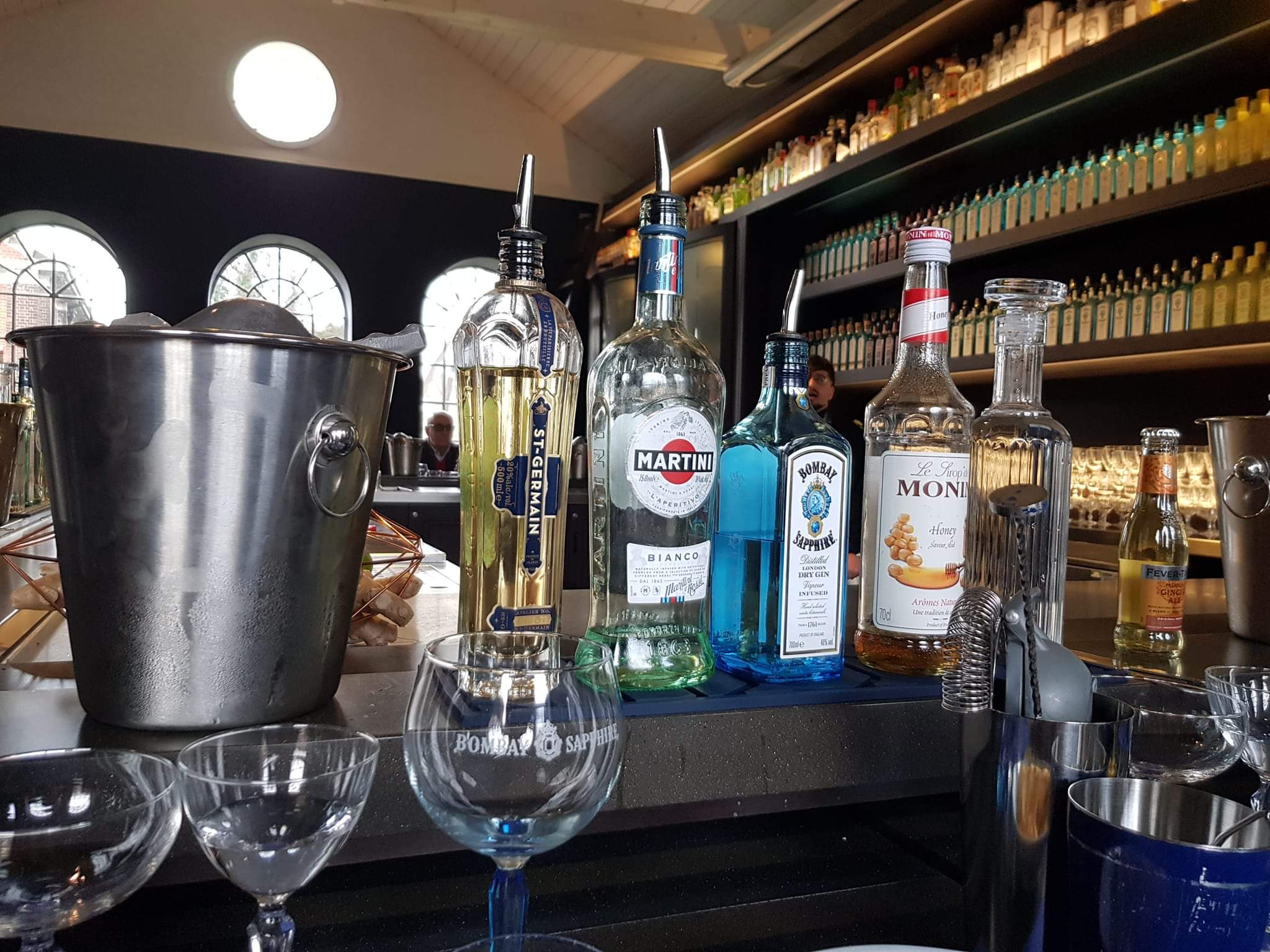 A selection of alcoholic drinks on a bar at Bombay Sapphire Distillery