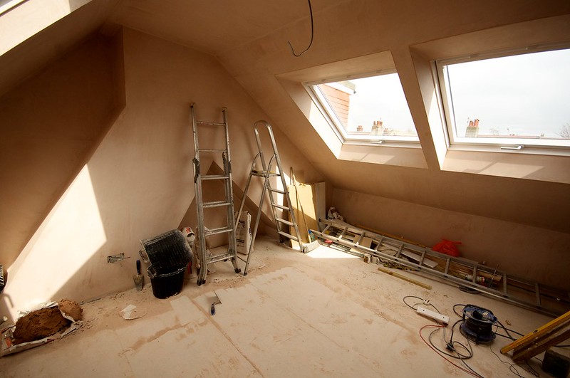 A loft conversion underway with two roof windows