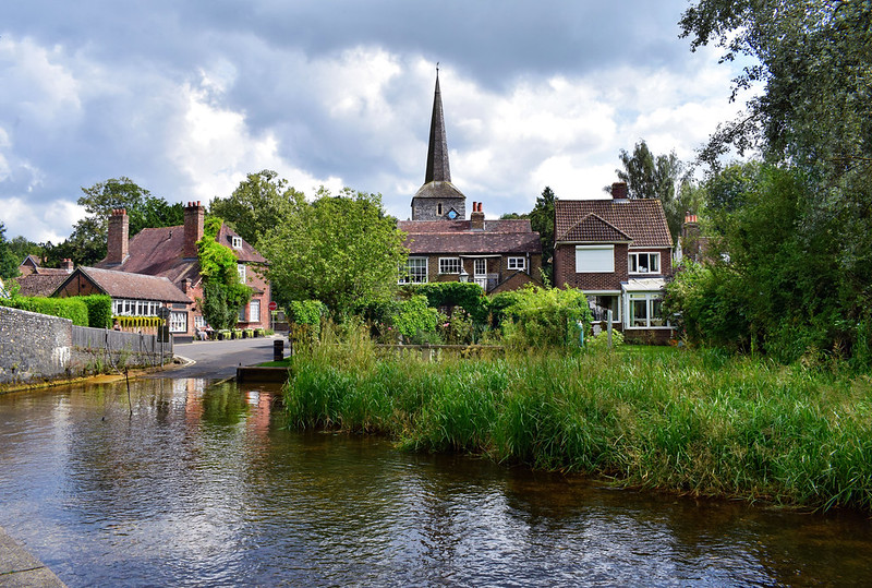 Looking across a river to an historic village.
