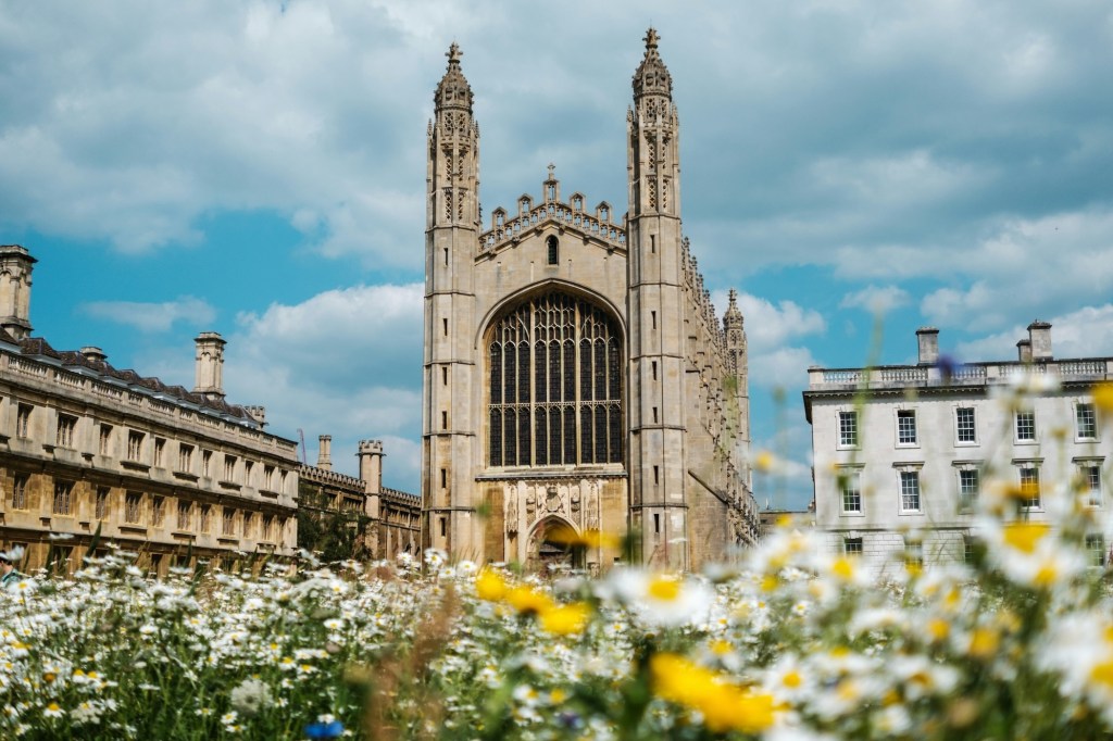 The tall main windows of a chapel in a Cambridge college.