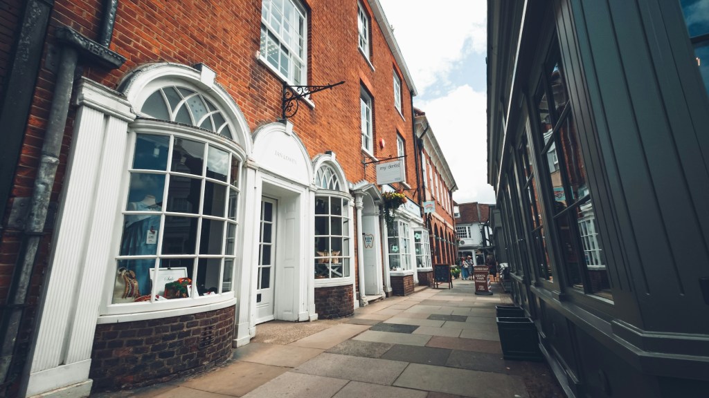 Looking past smart historic buildings on a. street in Farnham.
