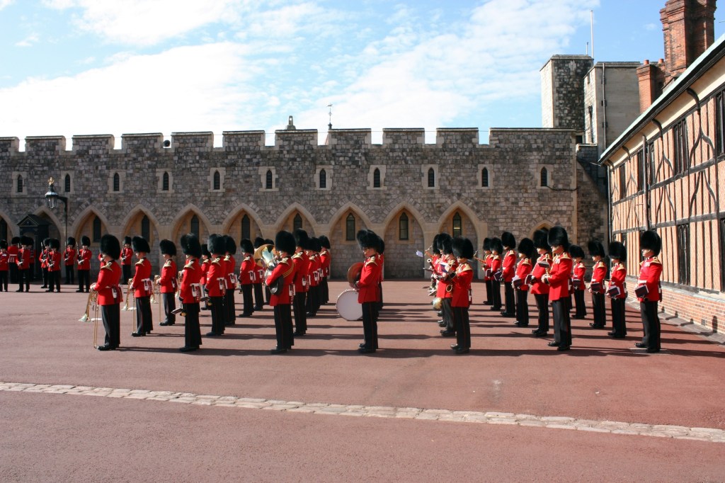 A military band in smart uniforms outside Windsor Castle.