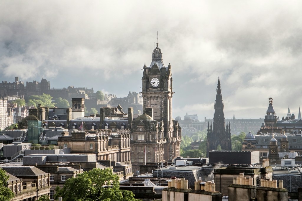 A view of the rooftops and clocktowers of Edinburgh.