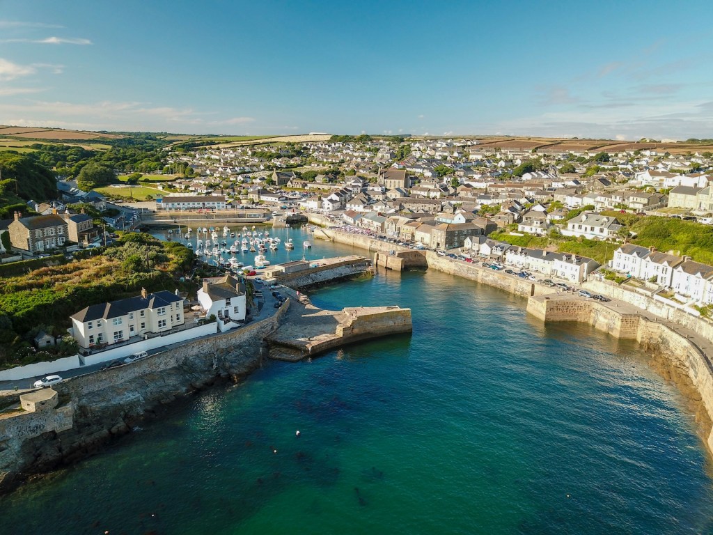 An aerial view of a harbour town in Cornwall.